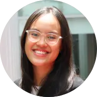 Asian woman with glasses, a kind smile and friendly attitude